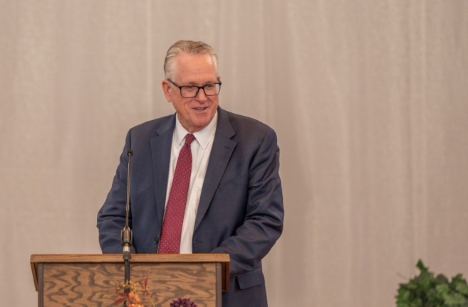 Elder Ken Denslow, Lake Union President, announces nominee Jim Micheff to serve as president. (PC: Ben Martin)