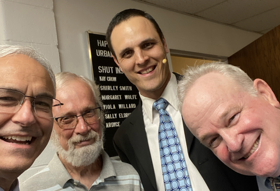 Micheff captures a heartfelt moment with Ron Metzger, Charles Rietman (speaker for the series) & Paul Bessemer, just prior to seeking the Lord in prayer.
